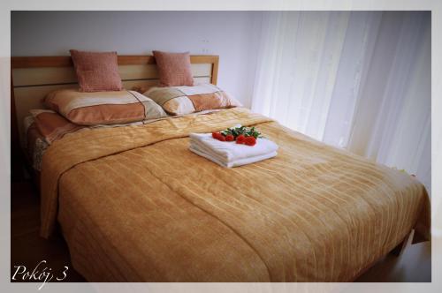 Кровать или кровати в номере Pokoje przy Morsie - Mielno