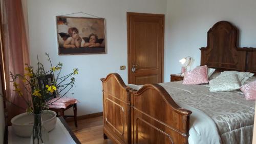 Postel nebo postele na pokoji v ubytování Bed and Breakfast Isabella