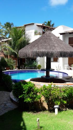 Het zwembad bij of vlak bij Apartamento Recanto dos Golfinhos