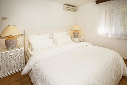 Ένα ή περισσότερα κρεβάτια σε δωμάτιο στο Apartment Marwin