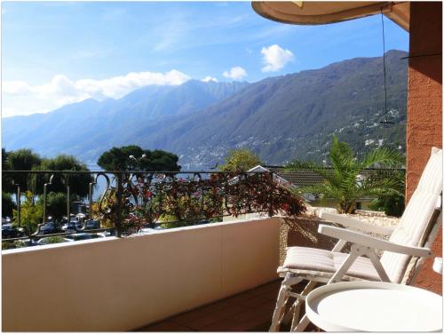 a balcony with a view of a mountain at Ferienwohnung Isabella in Ascona