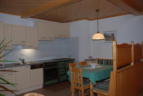 Kuchyň nebo kuchyňský kout v ubytování Appartement Grundner