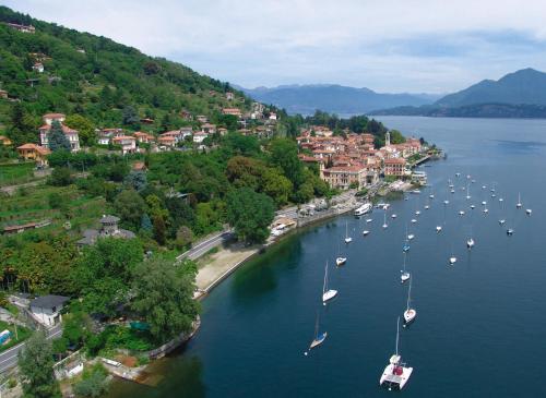 an aerial view of a harbor with boats in the water at Hotel Milano in Belgirate