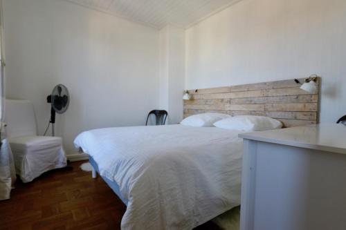 Tempat tidur dalam kamar di Océane