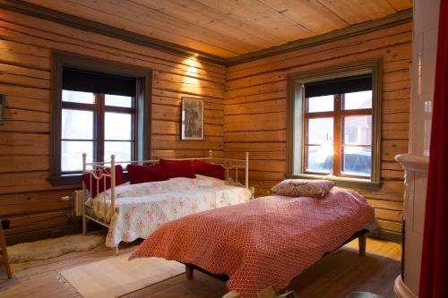 Un pat sau paturi într-o cameră la Stöpafors 110