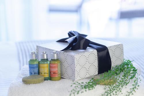 a gift box with four bottles of alcohol on a table at U Boutique Kinneret by the Sea of Galilee in Tiberias