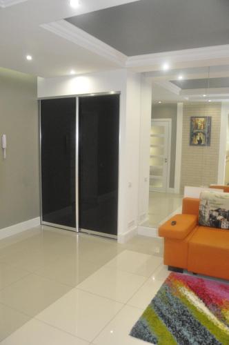Ruang duduk di Fireplace Apartment on Puliuia 40
