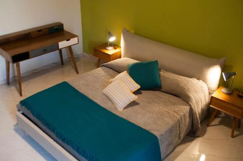 Cama o camas de una habitación en Retrò B&B