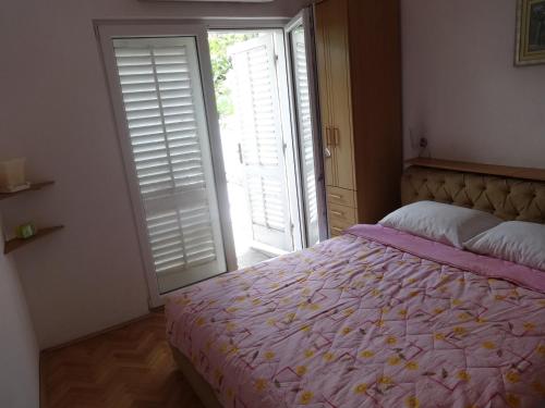 Cama o camas de una habitación en Seaside apartments and rooms