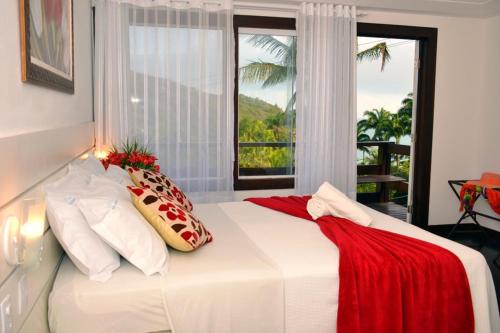 Postel nebo postele na pokoji v ubytování Coronado Inn Hotel