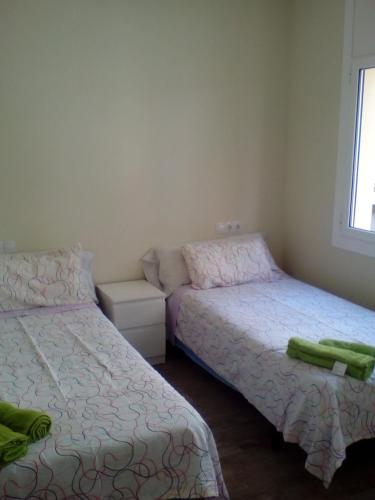 Voodi või voodid majutusasutuse Castel Apartments toas