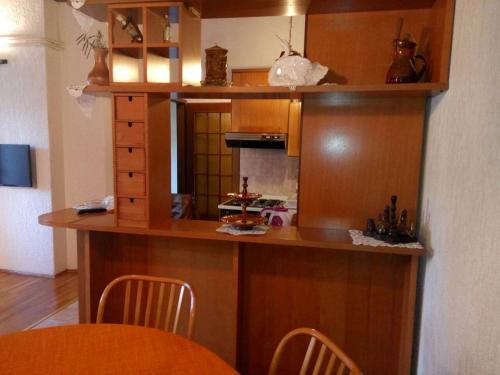 Η κουζίνα ή μικρή κουζίνα στο apartman & soba Škarica