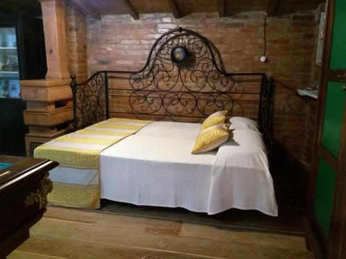 מיטה או מיטות בחדר ב-Podere Casina Rossa