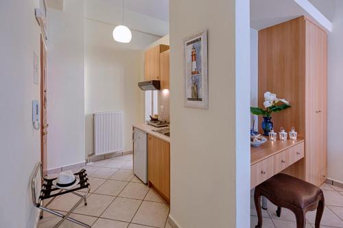 Kuchyňa alebo kuchynka v ubytovaní Antouanetta Apartments