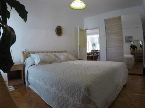 Кровать или кровати в номере Apartments Aleksić Old Town
