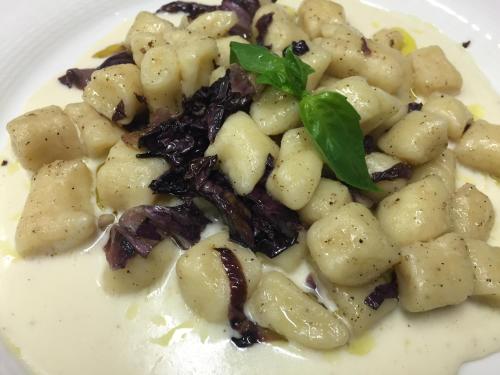 a plate of food with pasta on a white plate at Ristorante Stazione in Tesserete