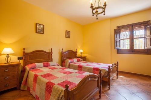 Een bed of bedden in een kamer bij La Solana De Domingo