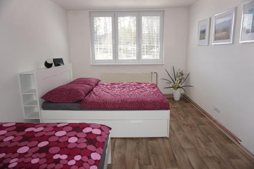 Postel nebo postele na pokoji v ubytování Apartmán Relax Nová Pec Lipno