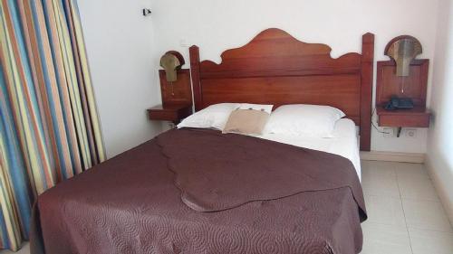 Postel nebo postele na pokoji v ubytování Palm'Studio Anse de Caritan