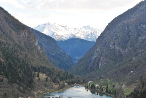 a view of a river in a valley with mountains at Hotell Millefiori- Alpine Event Lodge in Valtournenche