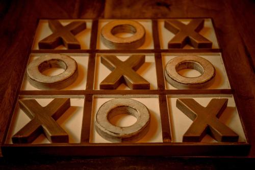 a wooden puzzle with donuts in a wooden box at Belle Le Vie in Sassafras