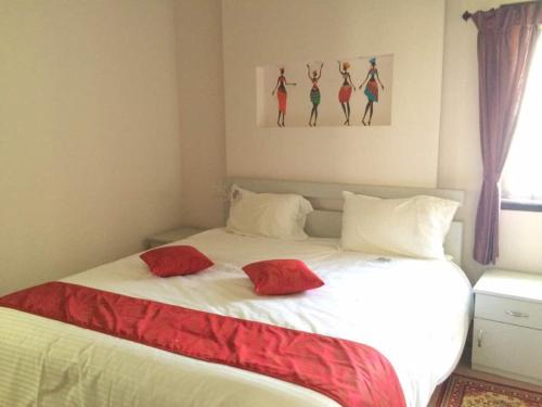 Ένα ή περισσότερα κρεβάτια σε δωμάτιο στο Sremethila Homestay