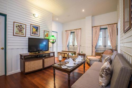 TV a/nebo společenská místnost v ubytování Kalanan Riverside Resort