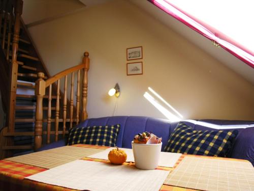 A bed or beds in a room at Christian Apartman