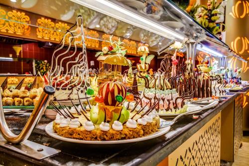 a display of food on a counter in a store at Seagull Beach Resort - Families and Couples Only in Hurghada