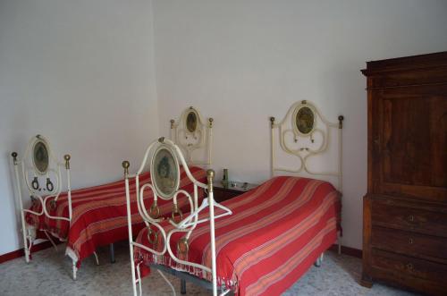 Postelja oz. postelje v sobi nastanitve Il Giardino del Sole