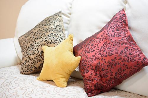 a group of pillows sitting on a couch at South Island in Itoman