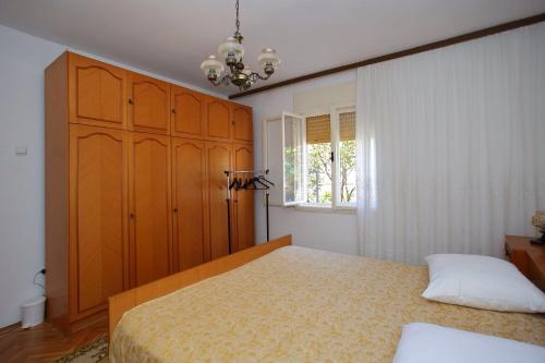Postel nebo postele na pokoji v ubytování Apartment Josip