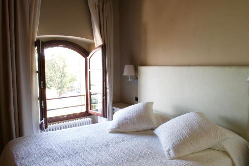 Кровать или кровати в номере Casa Girardi