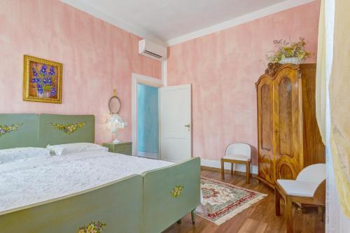 Кровать или кровати в номере Le Stanze di Ebe