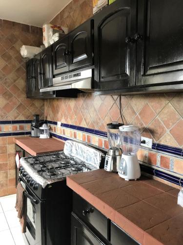 Una cocina o zona de cocina en Hostal Compostela Inn