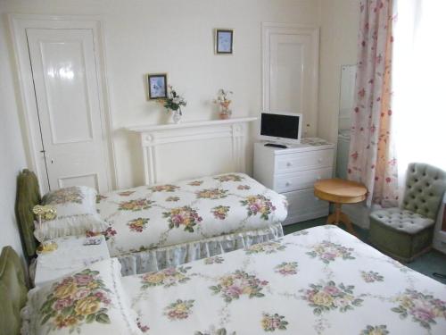 Ένα ή περισσότερα κρεβάτια σε δωμάτιο στο El Tabora Guest House