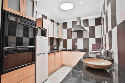 Dapur atau dapur kecil di Accommodation at Vans No Loadshedding