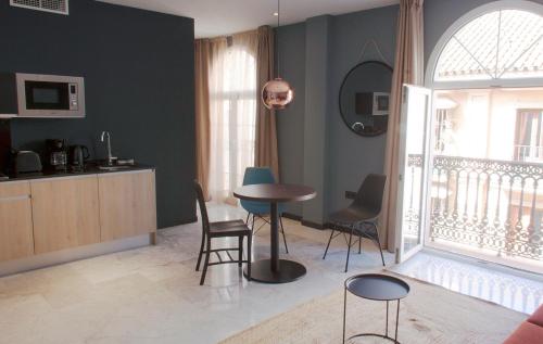 Ruang duduk di Apartamentos NONO by Charming Stay