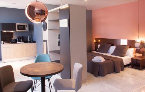 Posedenie v ubytovaní Apartamentos NONO by Charming Stay