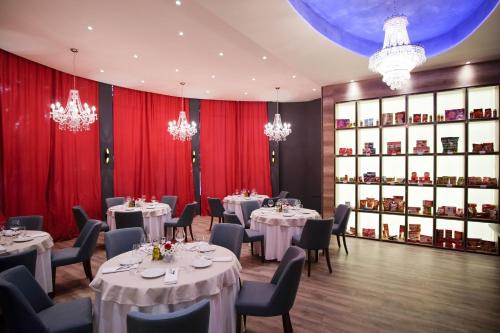 SL Industry Hotelにあるレストランまたは飲食店