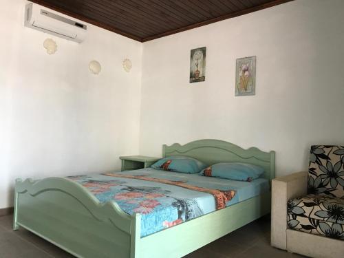 Postel nebo postele na pokoji v ubytování Akvitaniya Mini-Hotel