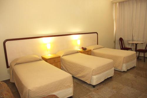 Ένα ή περισσότερα κρεβάτια σε δωμάτιο στο Free Palace Hotel