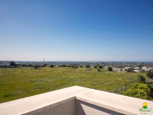 a view of a field from the roof of a house at Marilù B&B in Matino