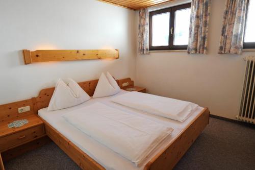 Postel nebo postele na pokoji v ubytování Kerschbaumerhof