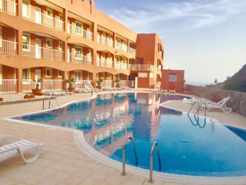 Bazén v ubytování Playa Paraiso DolceVita nebo v jeho okolí