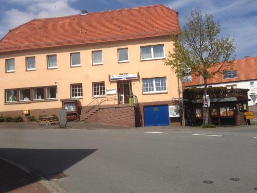 a building on the side of a street at Sauerland-Hotel in Essentho