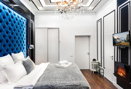 Letto o letti in una camera di Theatre Boutique Apartments