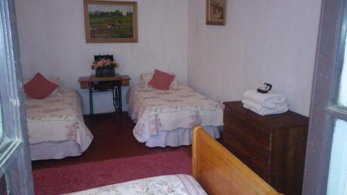 Postel nebo postele na pokoji v ubytování La Casa de Adobe Natural y Más