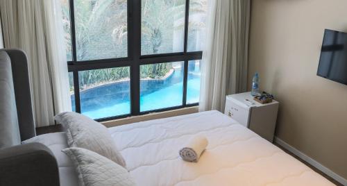 Postel nebo postele na pokoji v ubytování Hotel Village Premium Joao Pessoa