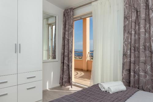 Posteľ alebo postele v izbe v ubytovaní Panorama Holidays